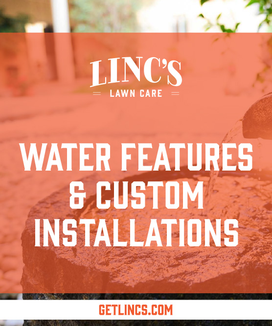 Image with the text LINCS Lawn Care at the top and Water Features & Custom Installations in bold letters. A beautiful stone water feature with flowing water is featured. At the bottom, discover more about our all seasons lawn maintenance at GETLINCS.COM.